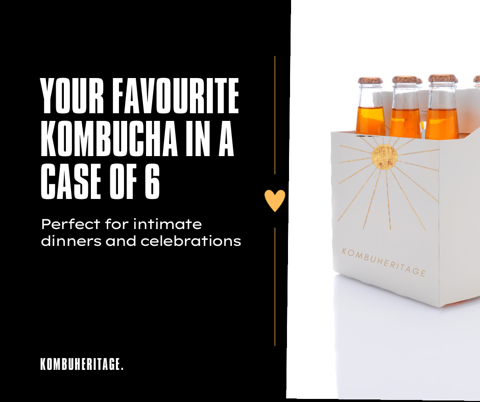 A white case with "KombuHeritage" branding contains six bottles of orange kombucha, named Seedling Sip 6X. Text on the left side reads, "Your favourite Kombucha in a case of 6. Perfect for intimate dinners and celebrations." Discover new Kombucha flavors with every monthly delivery. A small heart icon is also present.
